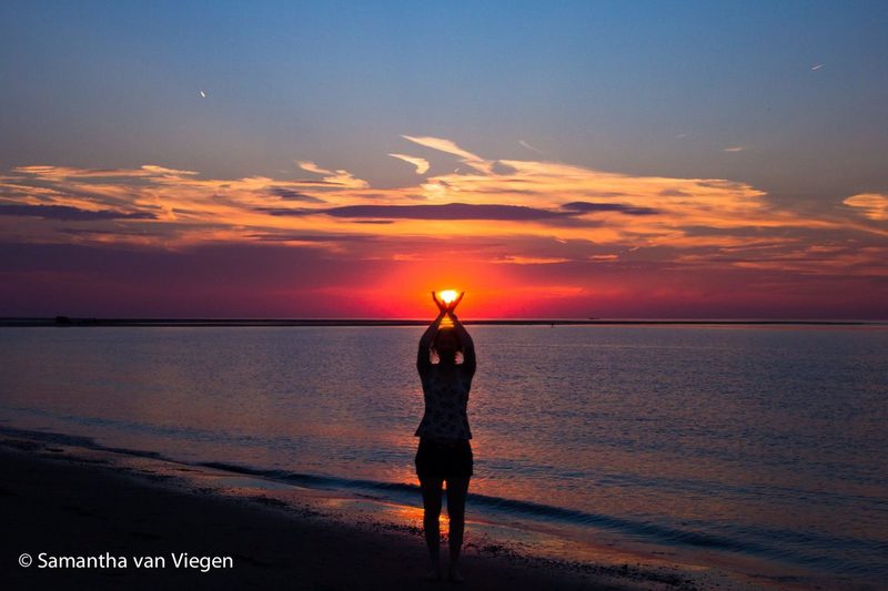 Zonsondergang aan zee