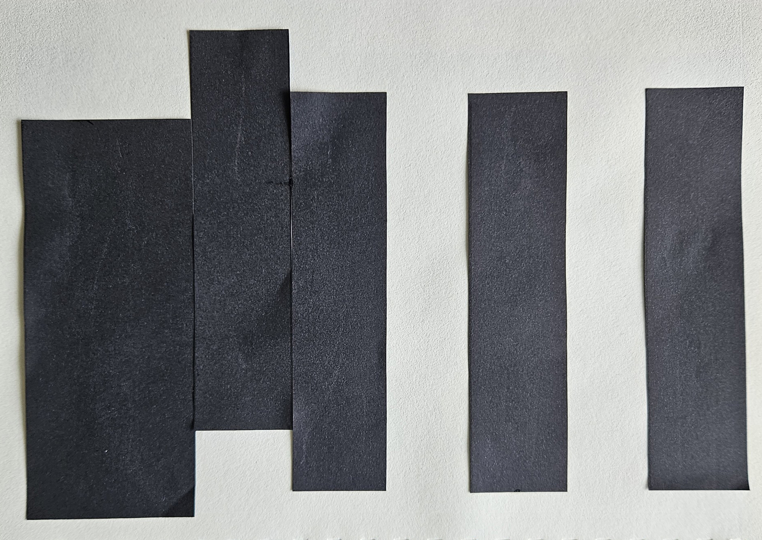 paper study black paper with vertical cuts 2
