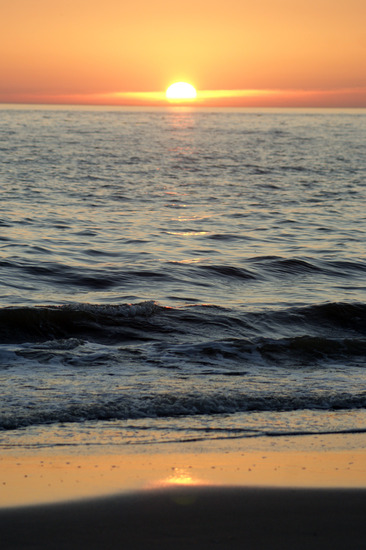 Zonsondergang aan zee