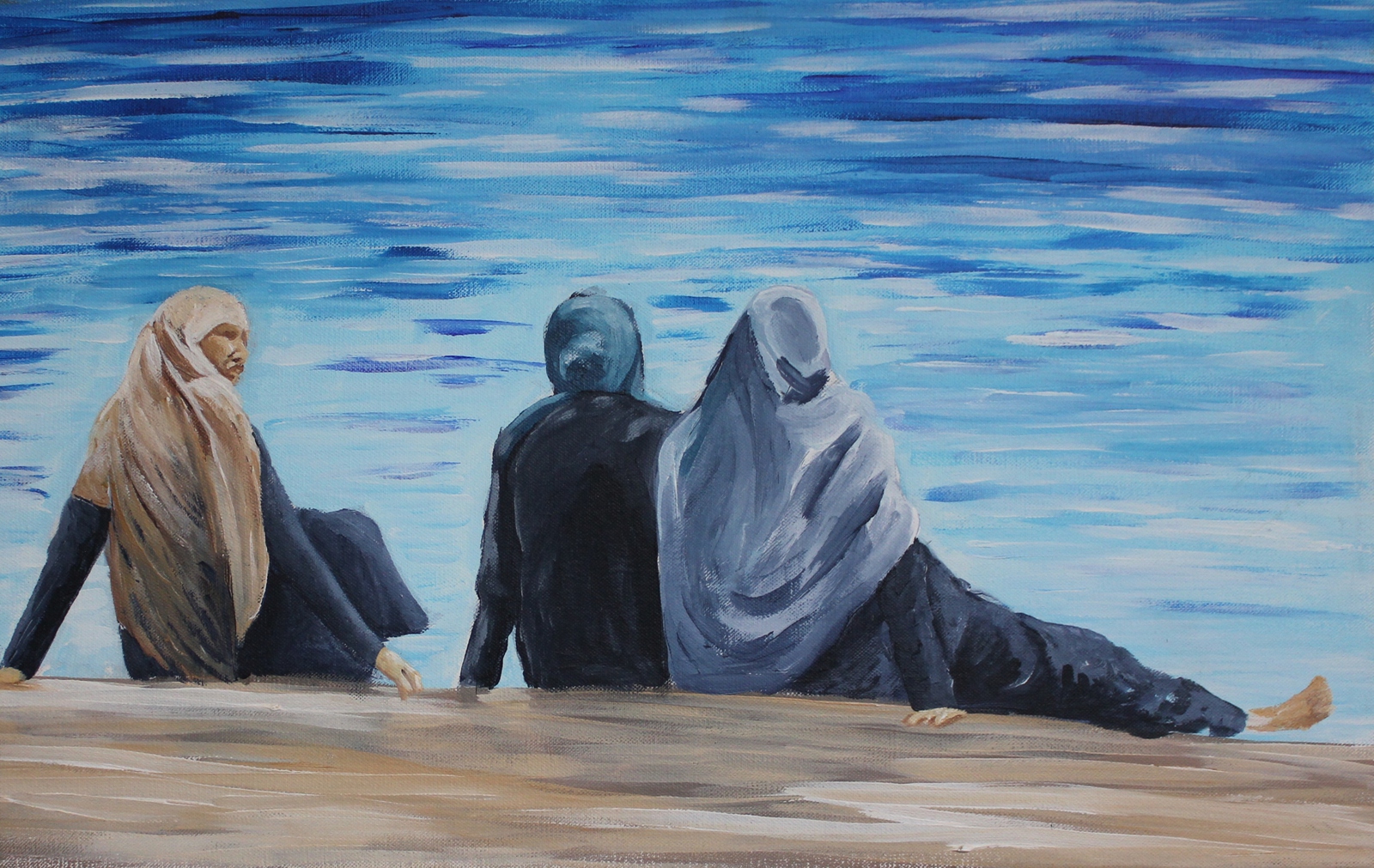 Drie Turkse vrouwen aan het strand