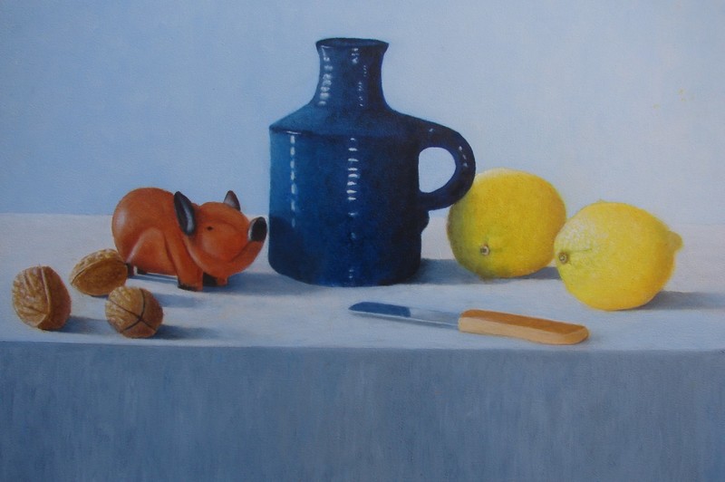 Citroenen met blauwe kan