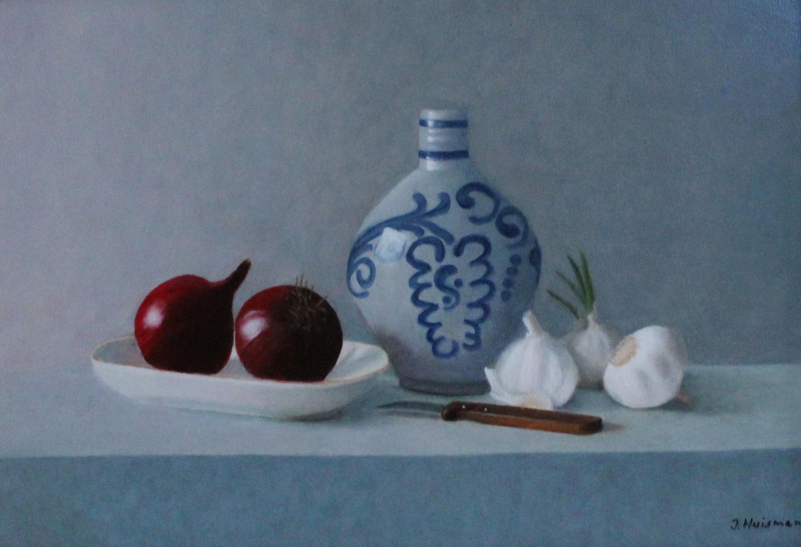 Keuls aardewerk met uien en knoflook