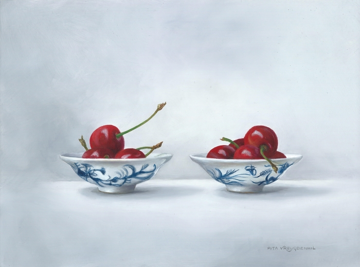 Twee schaaltjes met kersen