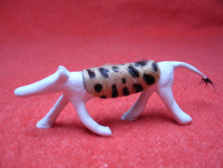 hond met tijgerdekje