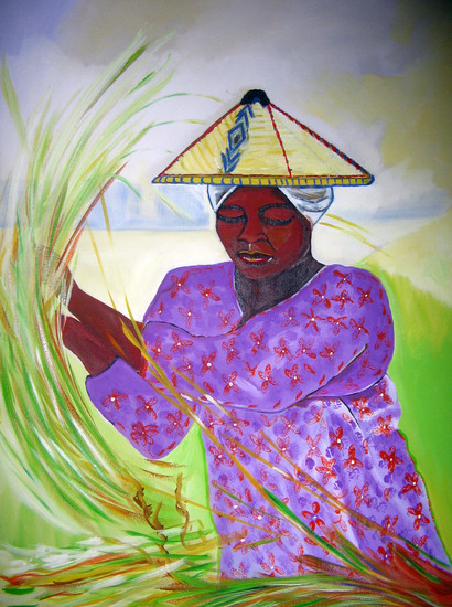 Thaise vrouw op rijstveld