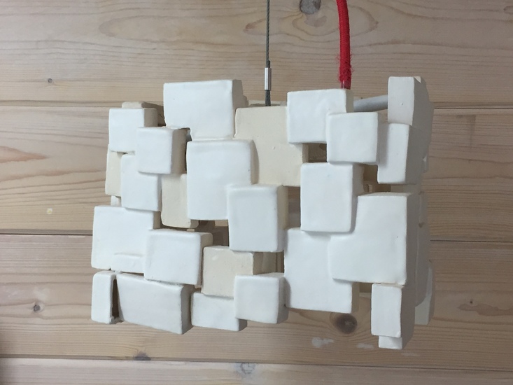 Hangend lampje van klei