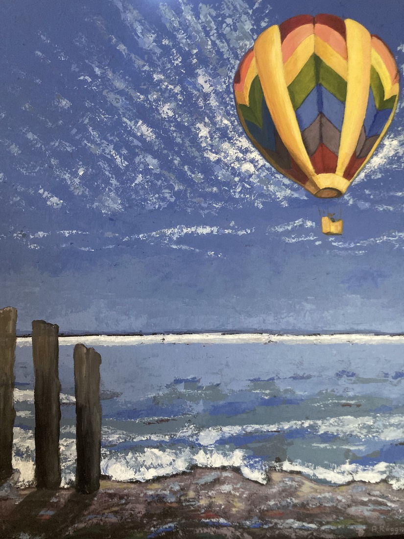luchtballon boven zee