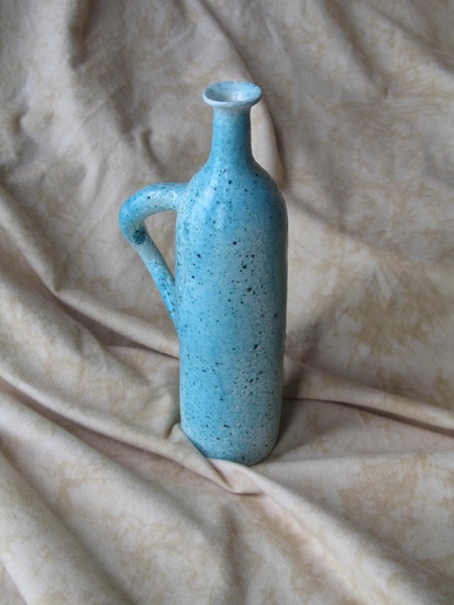 Bottle with ear