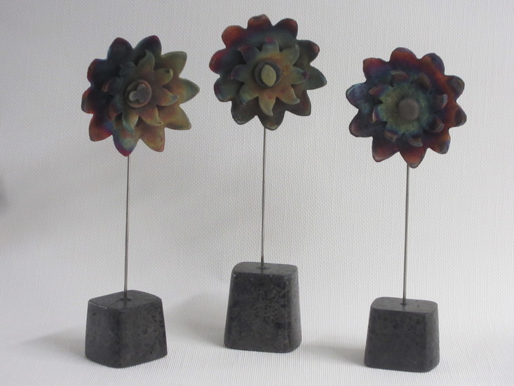 Bloemen raku-kopermat