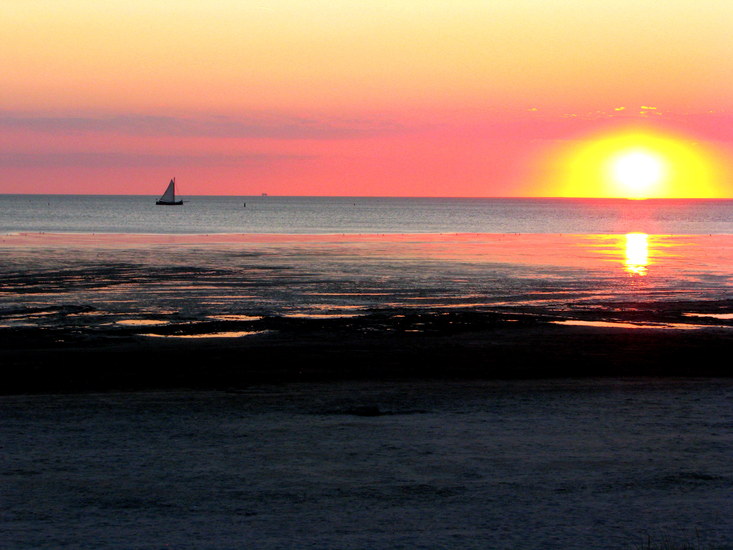 Zeilen bij zonsondergang