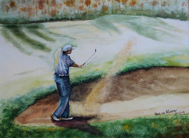Golfer in bunker