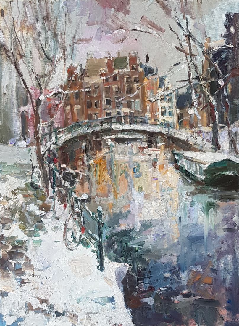 Canal under snow.Amsterdam