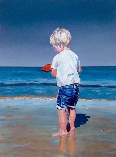 Jongen aan het strand