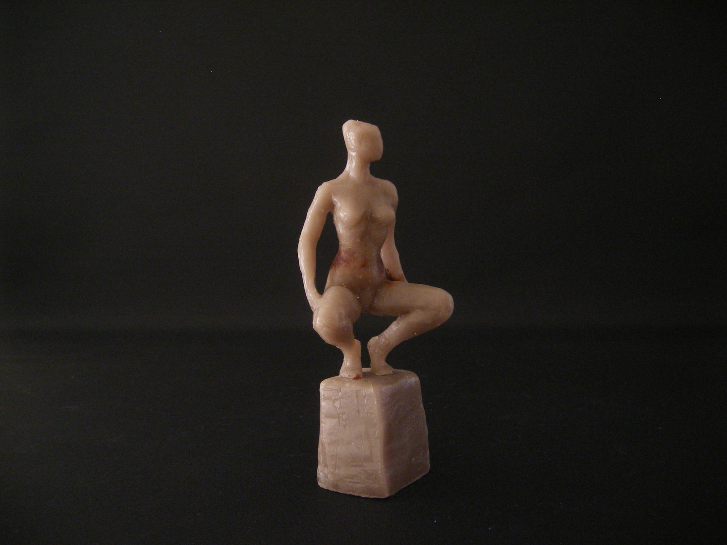 Danseres hurkende pose