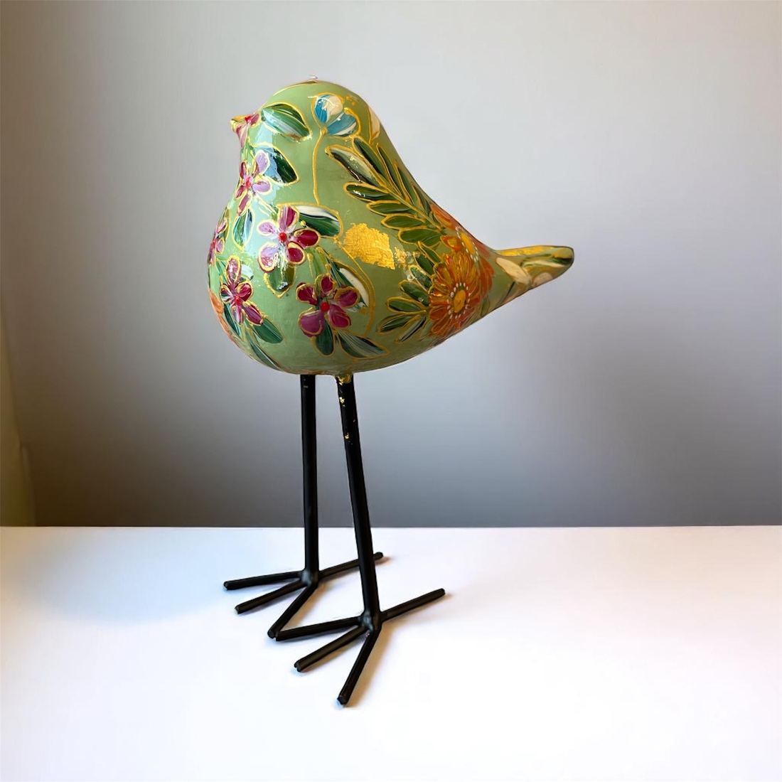 Zachtgroen vogeltje van glas