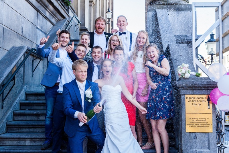 Groepsfoto met champagne