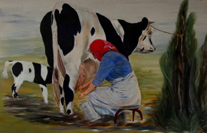 Maike melkt koe