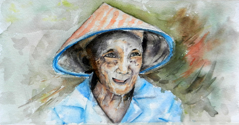 Werkster in de Indonesische rijstvelden