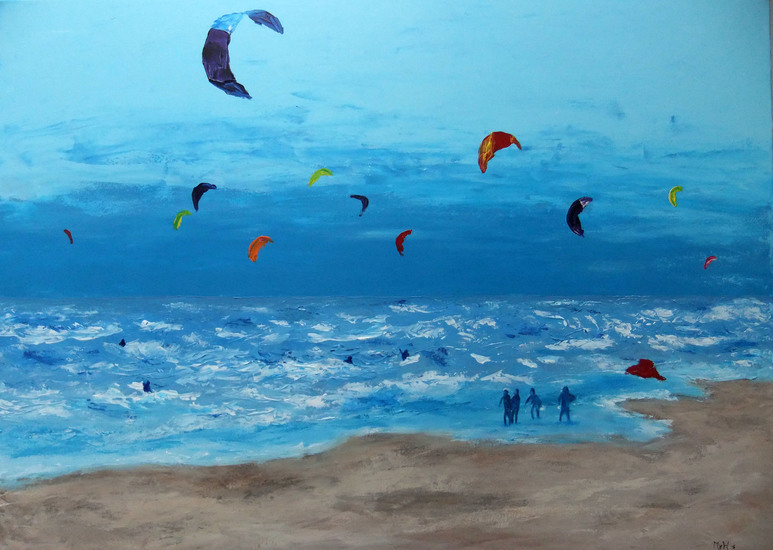 Kitesurfers op IJmuiden strand