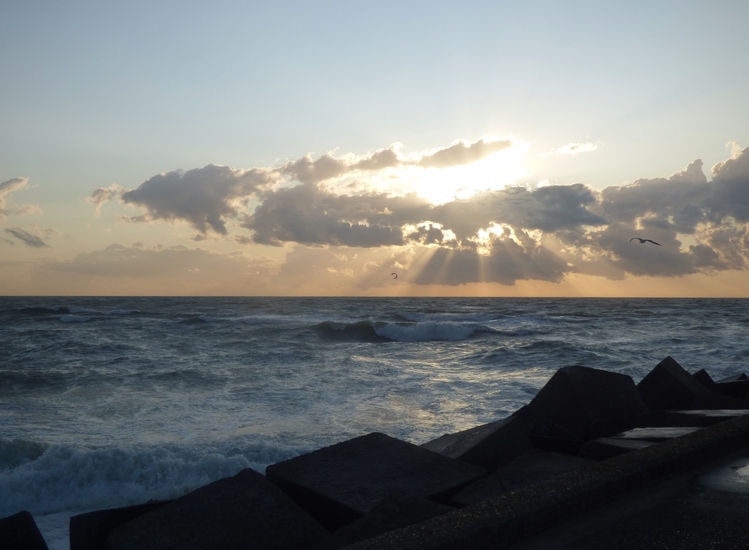 Zonsondergang aan zee