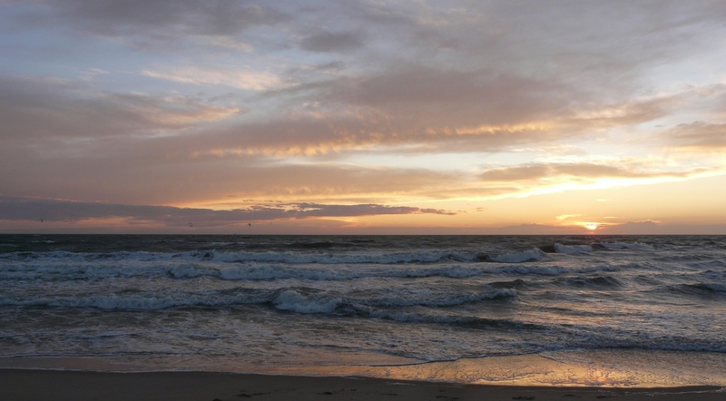 Zonsondergang aan zee