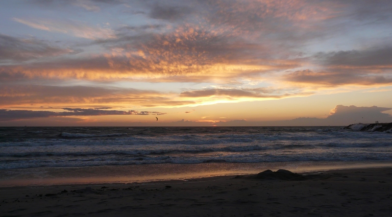 Zonsondergang aan zee