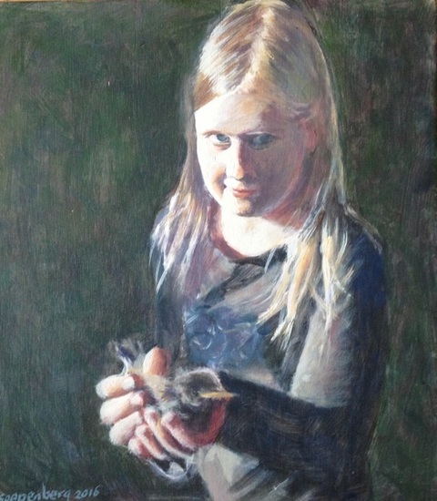 Esther met een jonge merel.