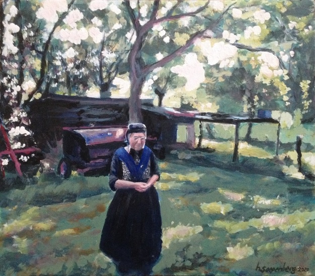 Oma bij het kippenhok.