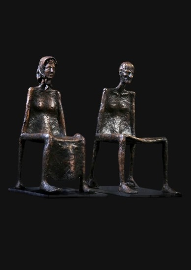 Twee mensstoelen vrouw-man