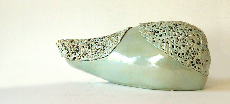 Opengewerkte visvorm.