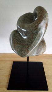 Foto’s van mijn beelden, gemaakt van diverse materialen zoals hout en steen