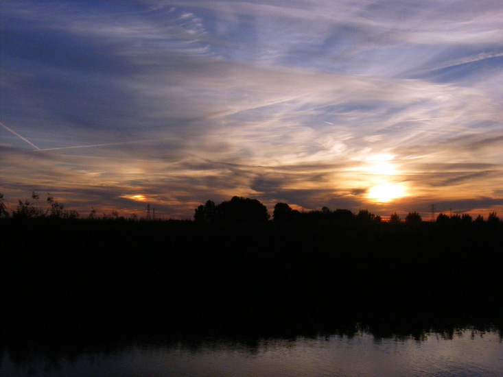 Zonsondergang met halo