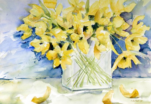 Gele tulpen in glazen bak