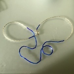 Colliers van glazen kraaltjes.