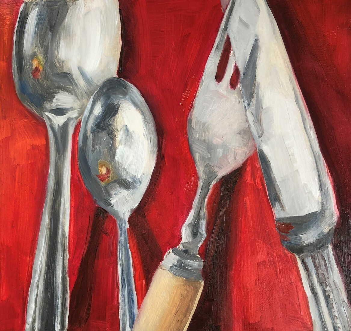 bestek op rood kleed