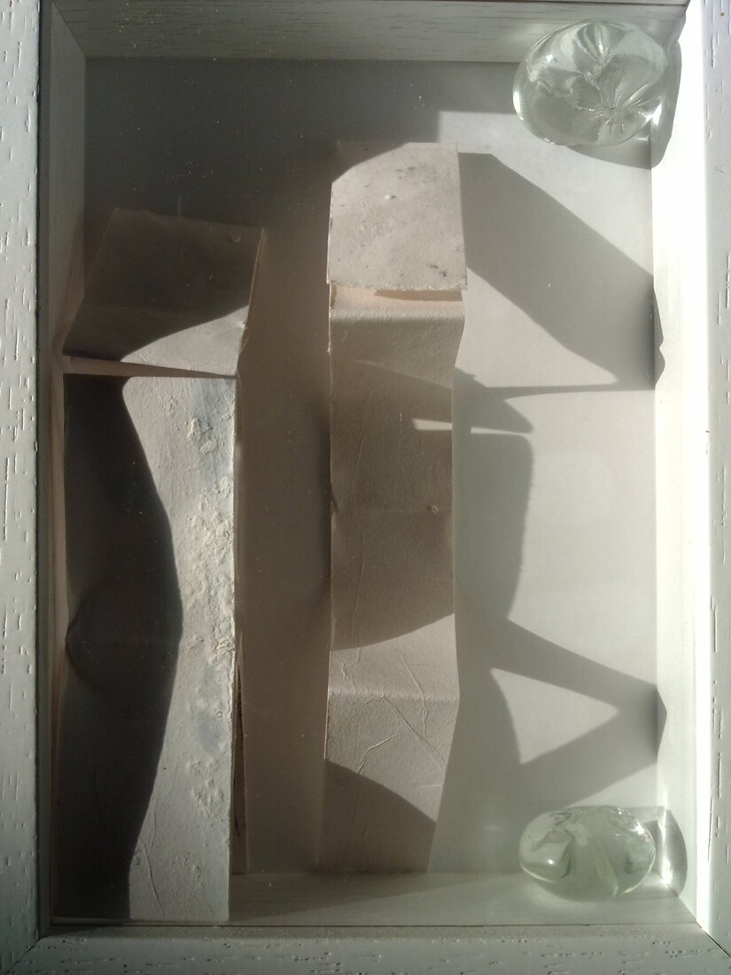 Vouwsel in lijstje met glasparels uit Murano