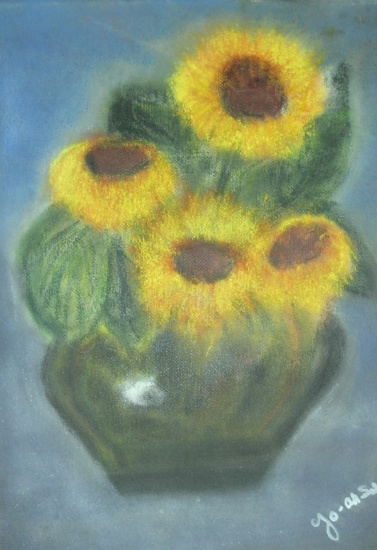 zonnebloemen in vaas