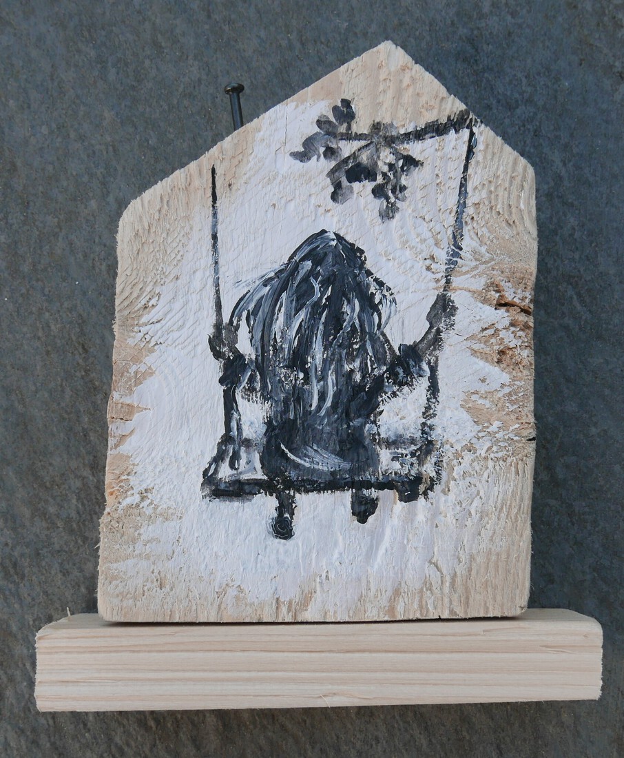 houten huisje schommel