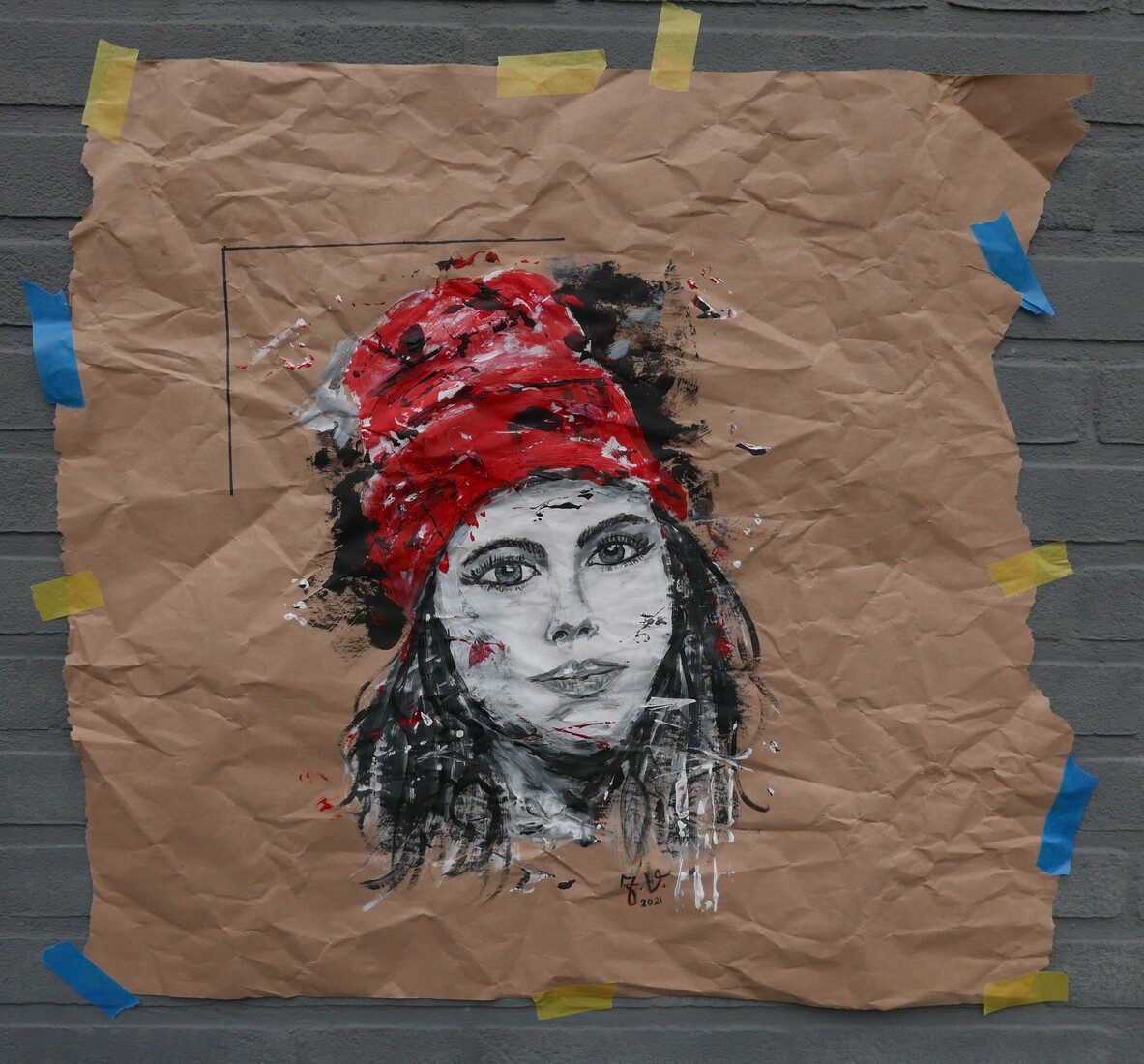 meisje met rode beanie