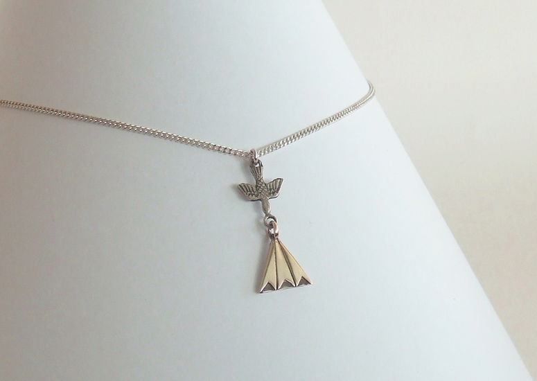 duifje met goudstralen