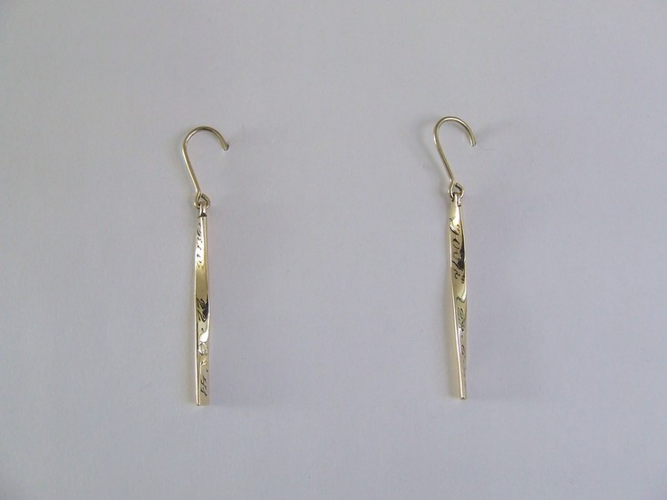 gouden oorhangers trouwringen