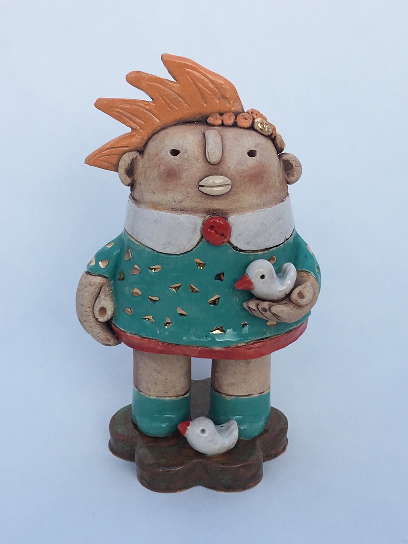 Little girl with two birds