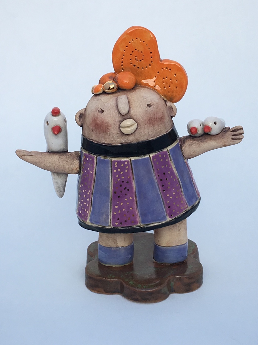 Little girl with three birds