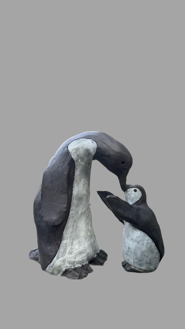 Moeder pinguïn met jong 