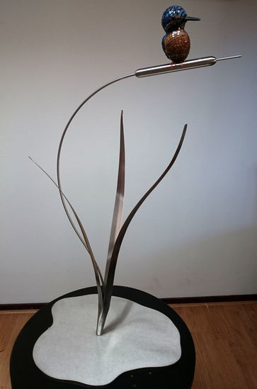 IJsvogel op lisdodde