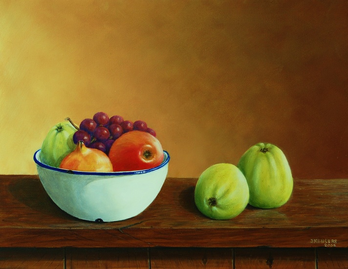 Witte kom met appels en druiven