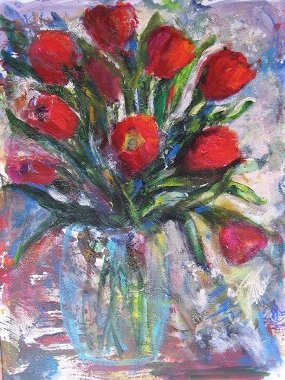 RED TULIPS IN A GLASS VASE