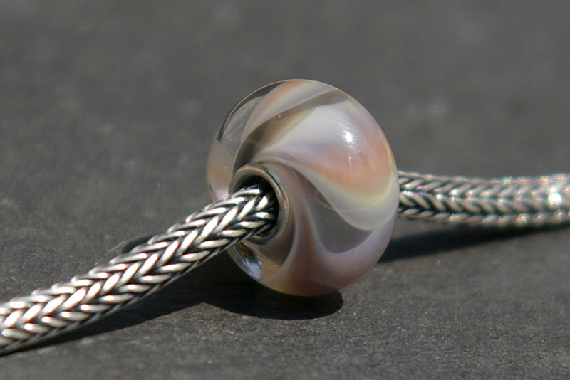 Glasbedel Kleurige steen