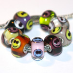 Glasbedels voor pandora-, trollbeads-, tedorasystemen met 925 zilveren kern en moretti glas uit murano. De kralen uit de verschillende sets kunnen los van elkaar verkocht worden.