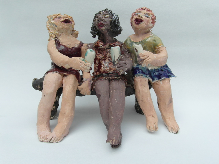 Tieners op een bankje